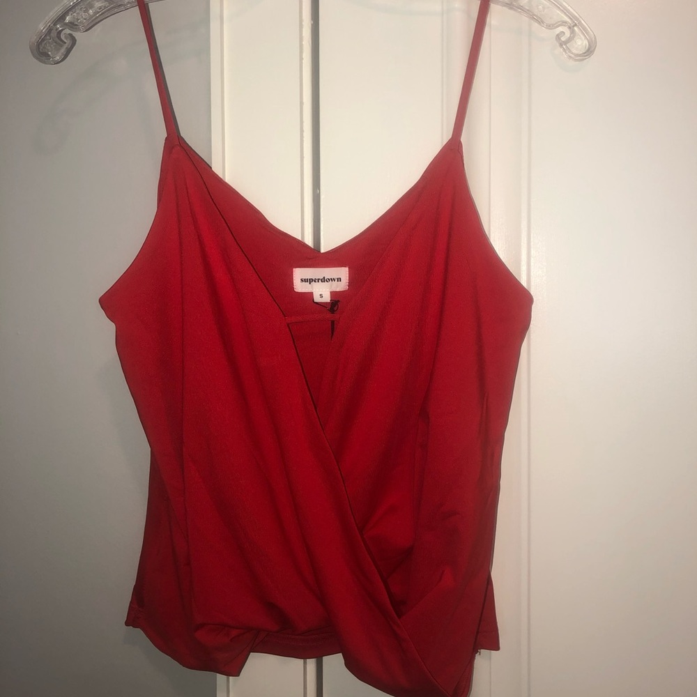 Red blouse. Brand new with tags size small